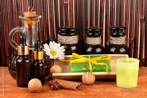 Photo: ingredients for soap making on brown background ingredients for soap making on brown background