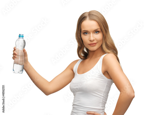 Photo: young beautiful woman with bottle of water young beautiful woman with bottle of water