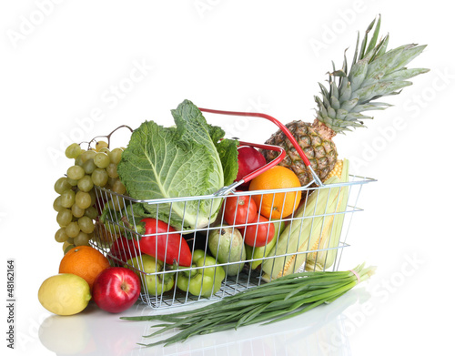 Photo: Fresh vegetables and fruits in metal basket isolated on white Fresh vegetables and fruits in metal basket isolated on white