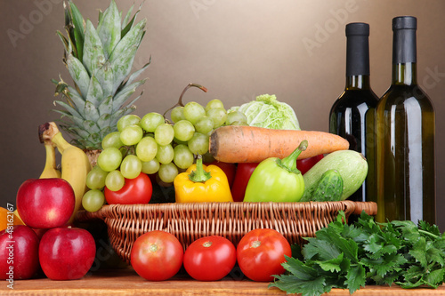 Photo: Composition with vegetables and fruits in wicker basket Composition with vegetables and fruits in wicker basket