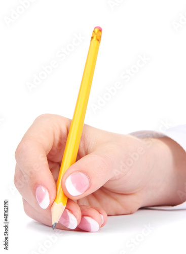 Photo: Closeup of businesswoman hand, writing on paper Closeup of businesswoman hand, writing on paper