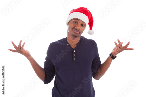 Photo: Young frustrated christmas man Young frustrated christmas man