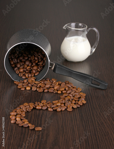 Photo: Coffee maker on brown table Coffee maker on brown table