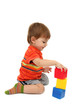 cute little boy with toy color cubes, isolated on white