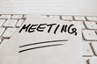 Notiz auf Computer Tastatur: Meeting