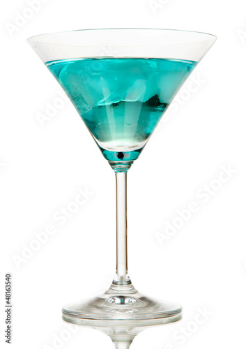 Photo: Blue Lagoon cocktail isolated on white Blue Lagoon cocktail isolated on white
