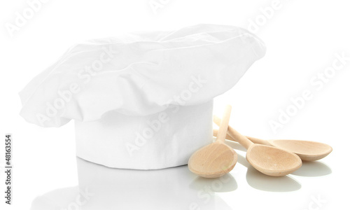 Photo: Chef's hat with spoons isolated on white Chef's hat with spoons isolated on white