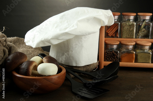 Photo: Composition with chef's hat and kitchenwear Composition with chef's hat and kitchenwear