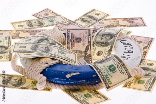 Photo: Rettungsring und Dollar. Rettung für Griechenland. Rettungsring und Dollar. Rettung für Griechenland.