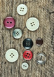 buttons on a wooden board