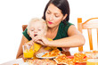 Foto: Woman with child drinking juice Woman with child drinking juice