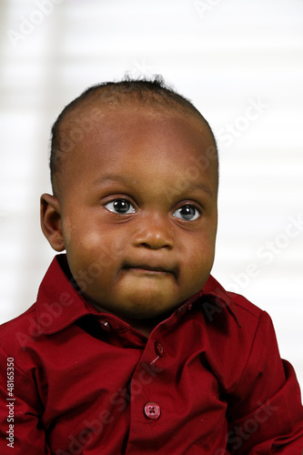 Photo: Boy Inside His Home Boy Inside His Home
