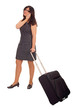 Photo: Business woman with suitcase and mobile phone Business woman with suitcase and mobile phone