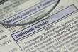 Photo: Searching a job from newspaper concept of employment Searching a job from newspaper concept of employment