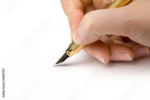 Photo: Pen in woman hand Pen in woman hand