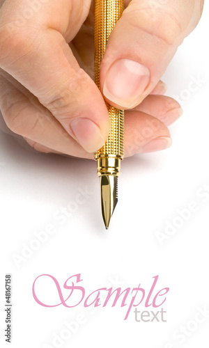 Photo: Hands with pen Hands with pen