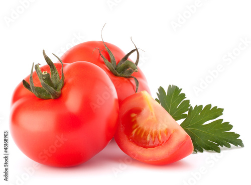 Photo: Tomato vegetables and parsley leaves still life Tomato vegetables and parsley leaves still life