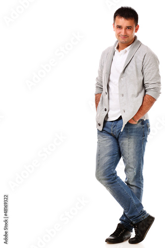 Photo: Young handsome man isolated over white background Young handsome man isolated over white background