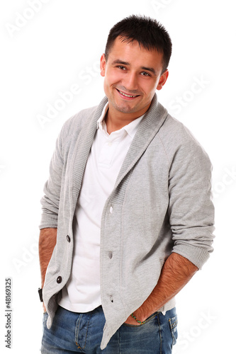 Photo: Young handsome man isolated over white background Young handsome man isolated over white background