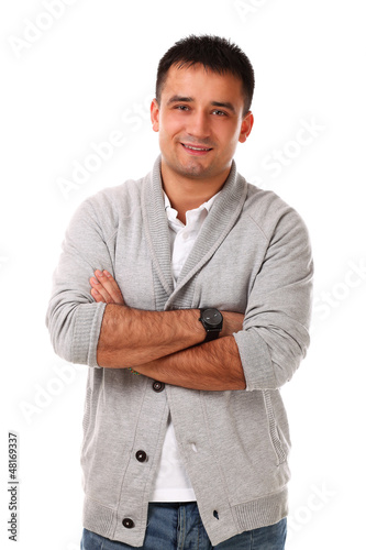 Photo: Young handsome man isolated over white background Young handsome man isolated over white background