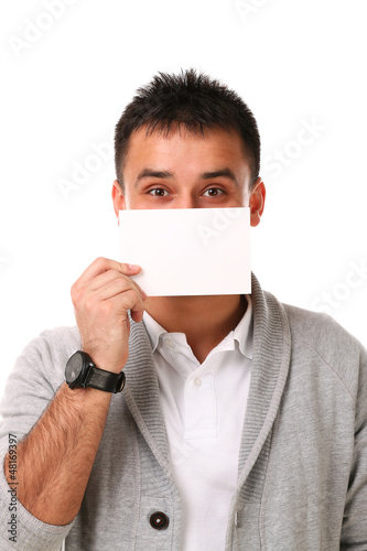 Photo: Young handsome man holding blank board Young handsome man holding blank board