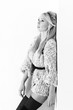 Photo: A black and white photo of a beautiful young woman A black and white photo of a beautiful young woman