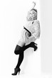 Photo: A black and white photo of a beautiful young woman A black and white photo of a beautiful young woman
