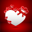 White paper hearth floating with red hearts