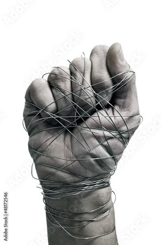 Photo: man hand tied with wire man hand tied with wire