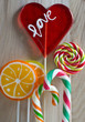 Colourful lollipop on wooden background