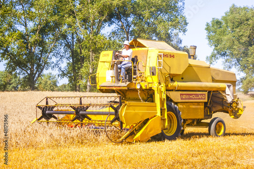 Photo: Combine harvesting corn Combine harvesting corn