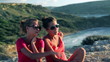 Happy women sitting near the vantage point and talking, crane sh