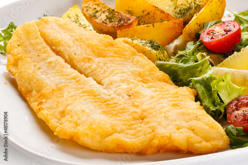 Photo: Fish dish - fried fish fillet and vegetables Fish dish - fried fish fillet and vegetables