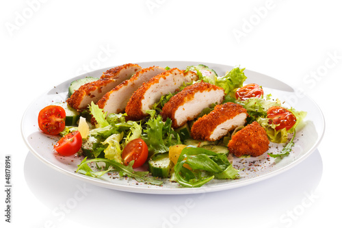 Photo: Fried chicken breast and vegetables Fried chicken breast and vegetables
