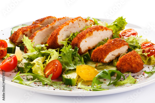 Photo: Fried chicken breast and vegetables Fried chicken breast and vegetables