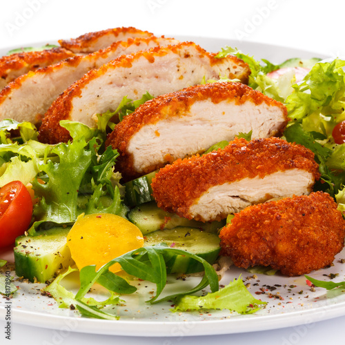 Photo: Fried chicken breast and vegetables Fried chicken breast and vegetables