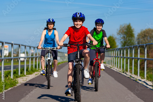 Photo: Active family biking Active family biking