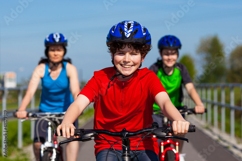 Photo: Active family biking Active family biking