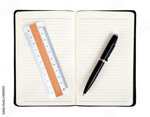 Photo: Notebook with pen and rule Notebook with pen and rule