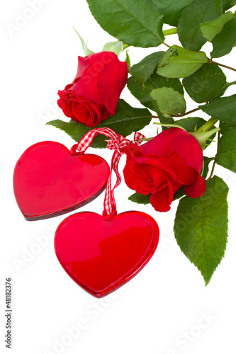 Photo: two glass hearts with roses two glass hearts with roses