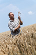 Landwirt - Bauer im Getreide Feld.