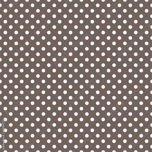 Vector: Polka dots seamless vector pattern texture on brown background Polka dots seamless vector pattern texture on brown background