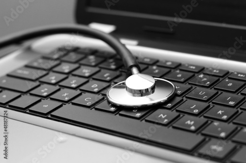 Photo: stethoscope on laptop keyboard stethoscope on laptop keyboard