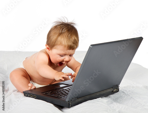 Photo: Infant using laptop Infant using laptop