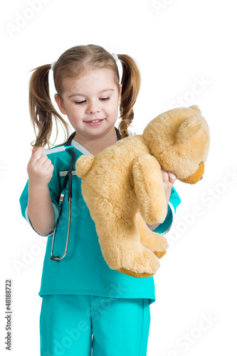 Photo: girl kid playing a doctor with syringe in hand isolated on white girl kid playing a doctor with syringe in hand isolated on white