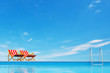 Swimming pool with beach chairs