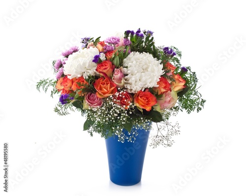 Photo: Fresh flowers in a blue vase Fresh flowers in a blue vase