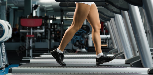 Photo: woman running on a treadmill woman running on a treadmill