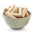 Bread sticks bowl isolated on white