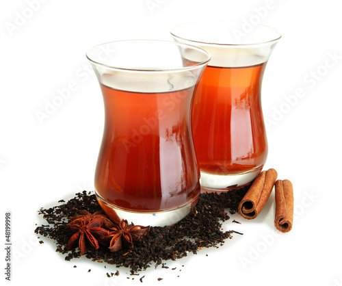 Photo: glasses of Turkish tea, isolated on white glasses of Turkish tea, isolated on white